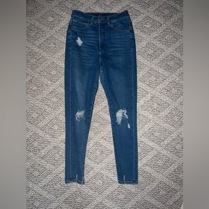 Hugh waisted cropped stretch skinny jeans. Ankle cut.